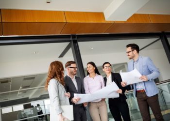 Corporate business team and manager in a modern meeting room