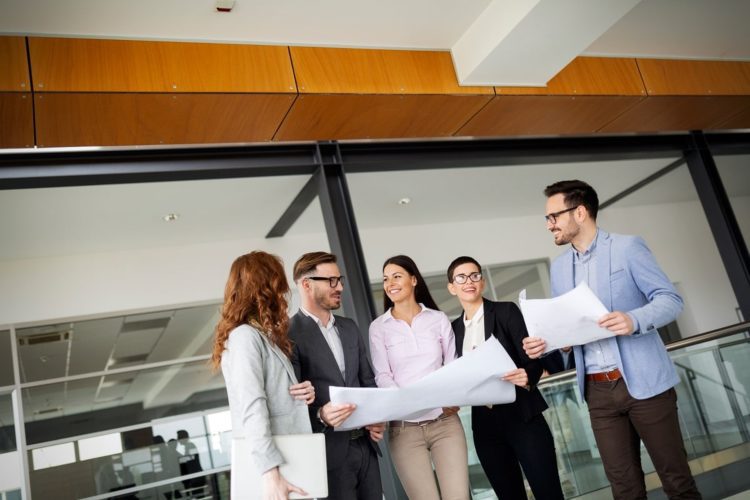 Corporate business team and manager in a modern meeting room