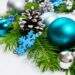 Merry Christmas background with silver, blue, turquoise baubles, fir branches and pine cones wreath