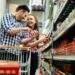 Couple shopping at supermarket together
